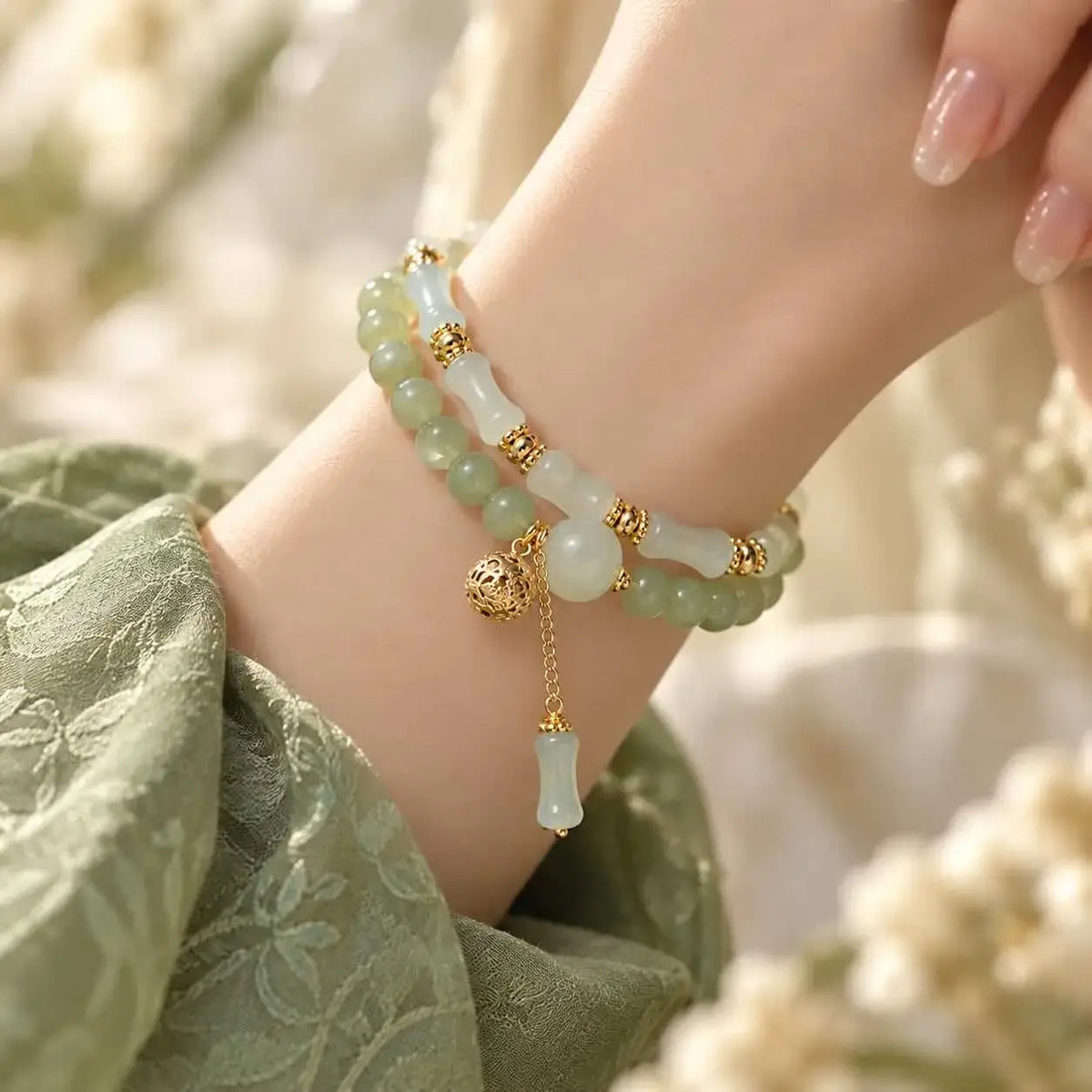 Green and White Jade Bracelet with Gold-Tone Accents