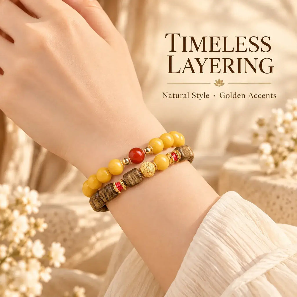 Side view of warm yellow amber and wood beads on the wrist