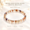 Black Gold crystal bracelet with 6 mm beads, warm inclusions and purple accents