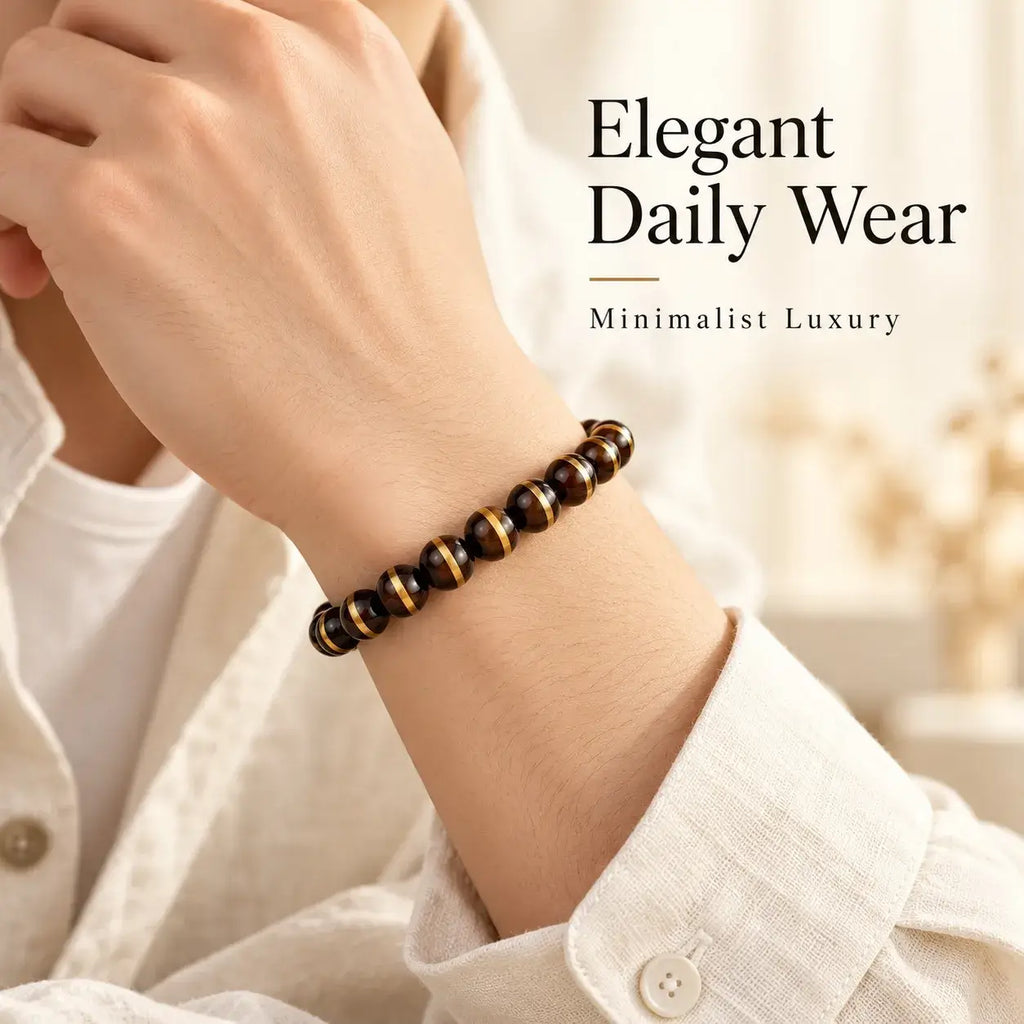 Black Zijinshu copper-line bracelet worn on the wrist with a light shirt cuff