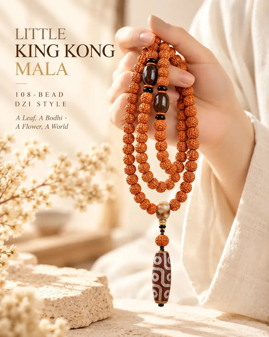 Long 108 bead bodhi seed mala held in the hand