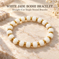 White jade bodhi seed bracelet with rounded ivory beads and gold-tone copper spacers