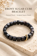 Natural ebony sugar cube bracelet with 8 mm square wood beads and a gold-tone ring