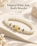 Natural white jade bodhi seed bracelet with 7 × 6 mm ivory beads, gold-tone spacers and a pale yellow carved centerpiece