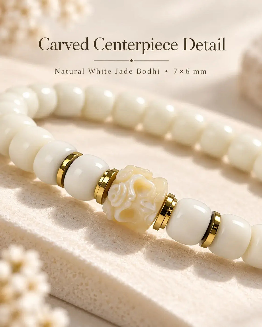 Close-up of the pale yellow carved centerpiece, ivory bodhi seed beads and gold-tone spacers