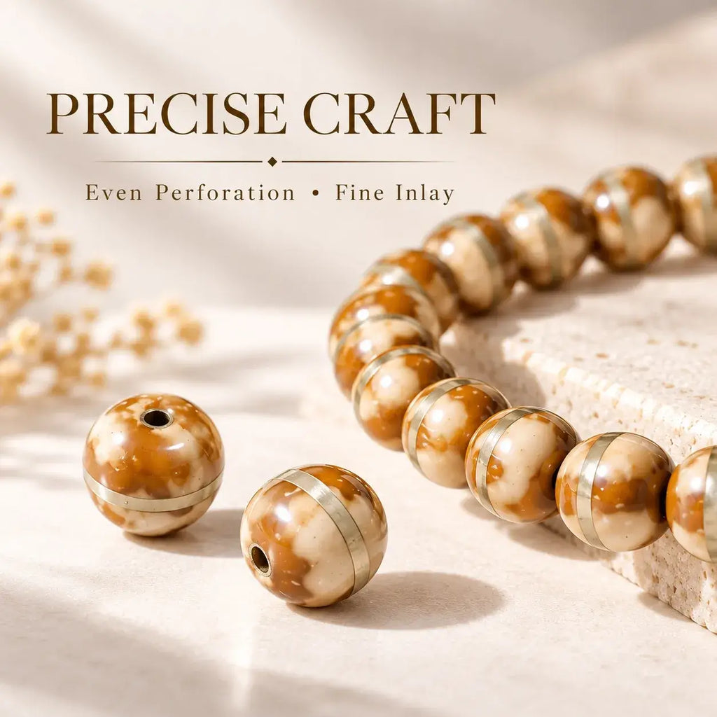 Detail of piebald Zijinshu seed bead surfaces and copper line inlay