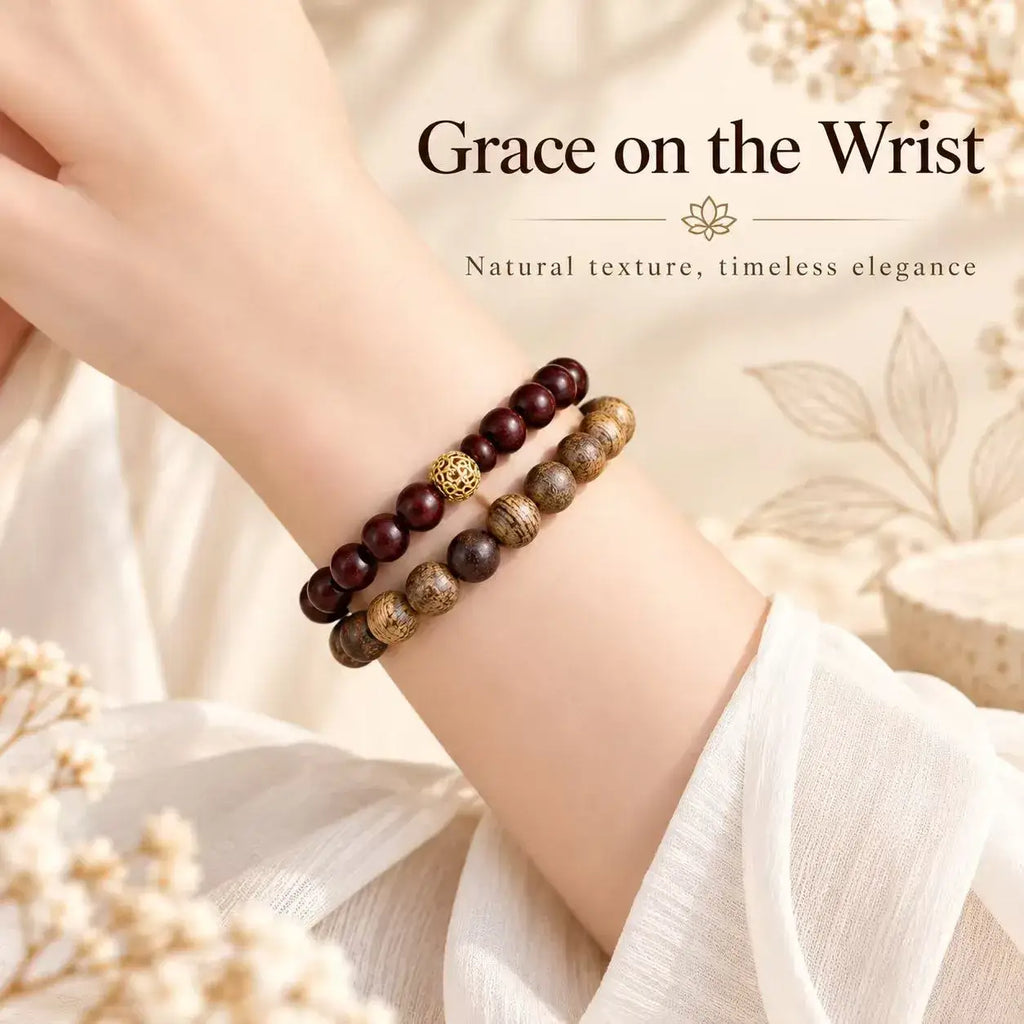 Double wrap bracelet with deep red and grained brown wood beads on wrist