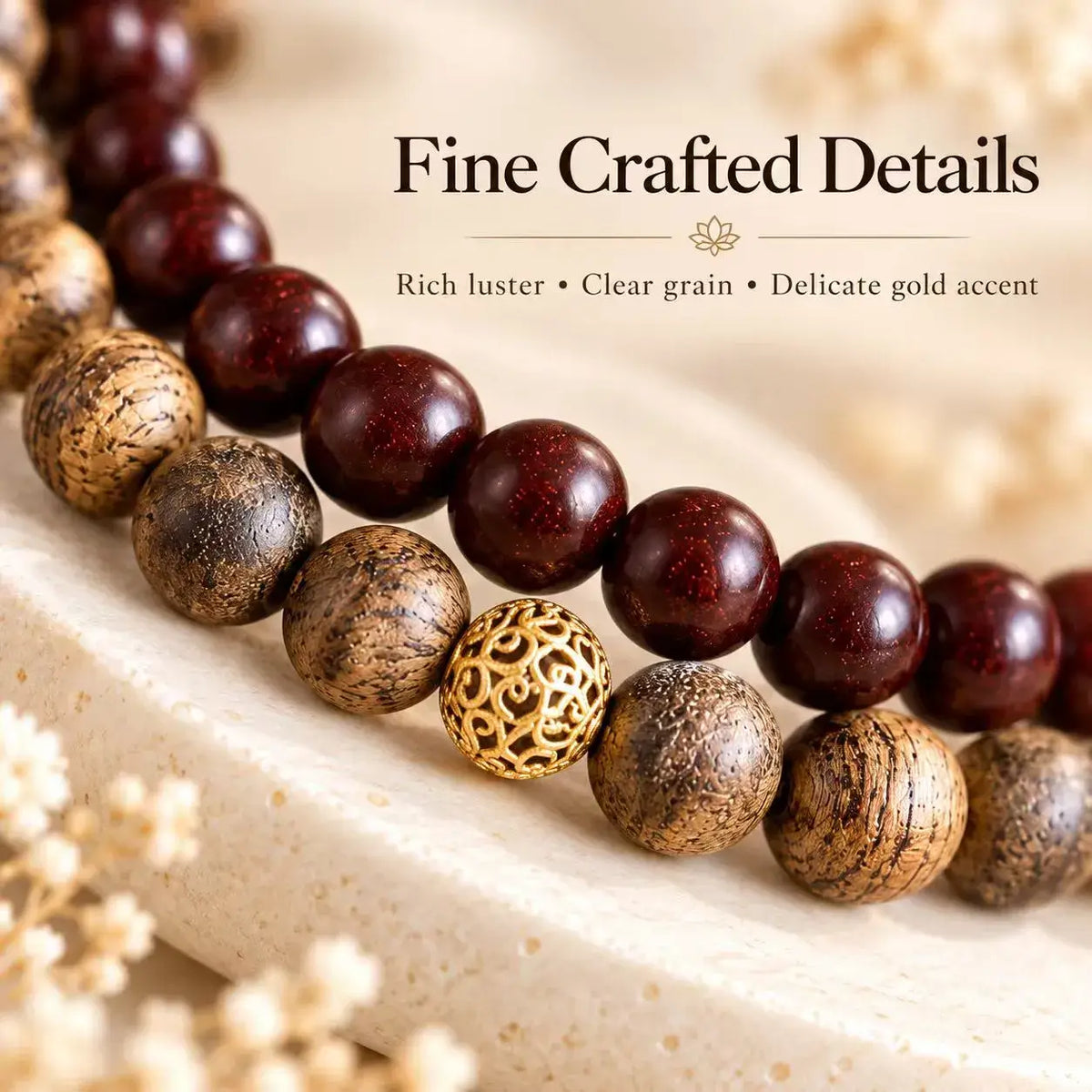Close-up of wood grain and a gold-tone openwork decorative bead