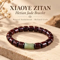 Red sandalwood bracelet with a pale green Hetian jade bamboo-shaped bead