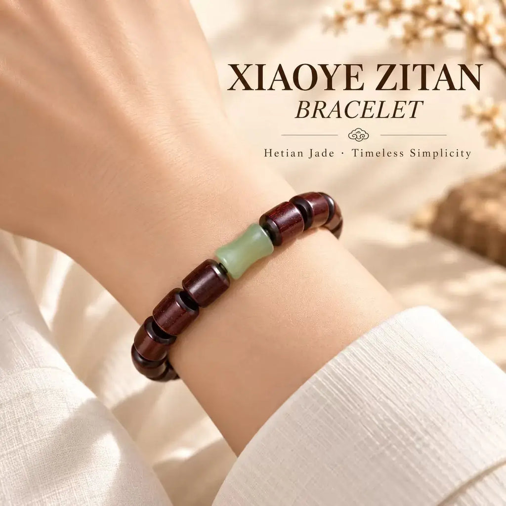 Red sandalwood and bamboo-shaped jade bracelet worn on wrist