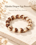 Natural three-eye Zijinshu Dragon Egg seed bracelet with 12 mm chestnut brown and cream mottled beads